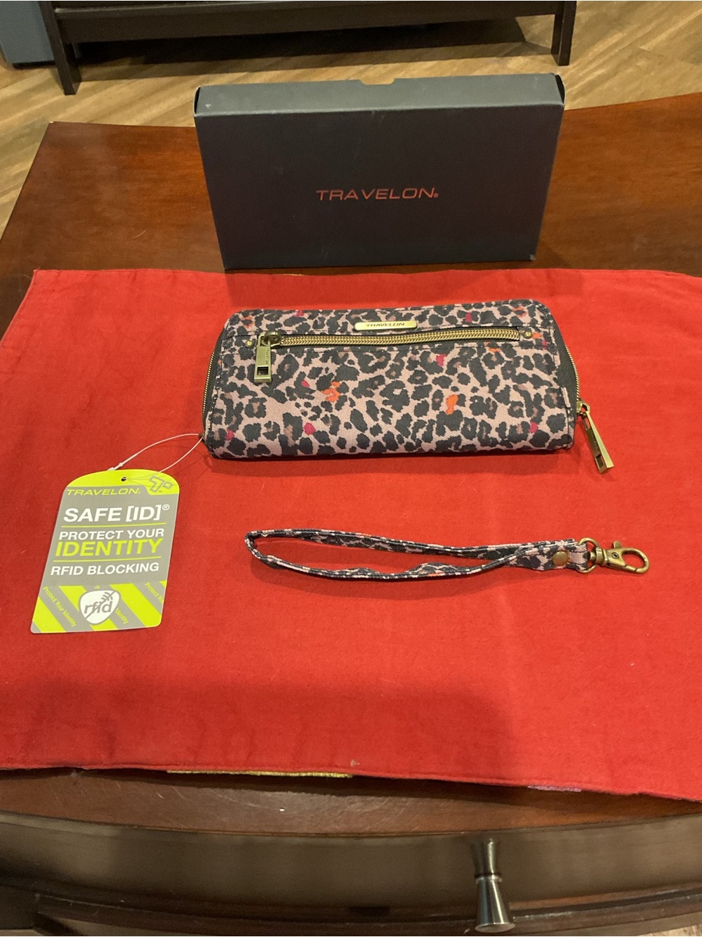 Travelon Leopard-Print RFID Wristlet in Pink and Black with Gold Hardware